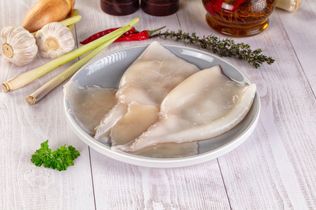 Raw calamari bodies for cooking - protein dietの写真素材