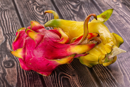 Sweet fresh red and yellow Dragon fruit pitahayaの写真素材