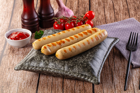 Grilled Bavarian white veal sausages in the plateの写真素材