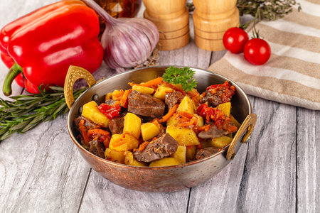 Homemade Rogiut with meat, potatoes and tomatoesの写真素材