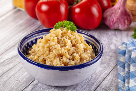 Vegan cuisine - boiled bulgur cereal garnishの写真素材