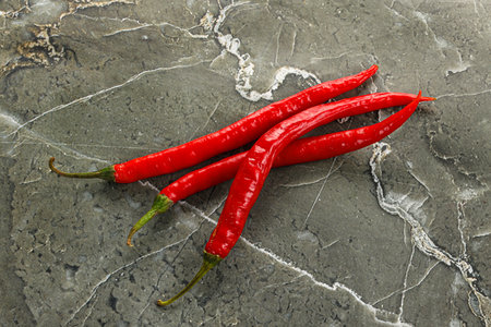 Red hot chilli peppers heap for cookingの写真素材