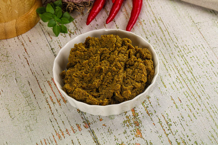 Yellow Thai spicy curry paste ingredient for cooking