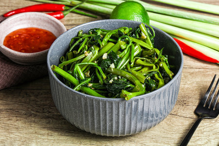 Asian cuisine stir fried morning glory with sauce