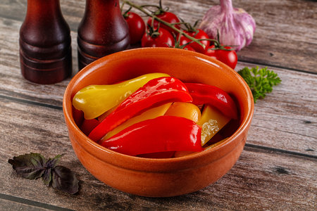 Marinated bell pepper parica slices in the bowlの写真素材
