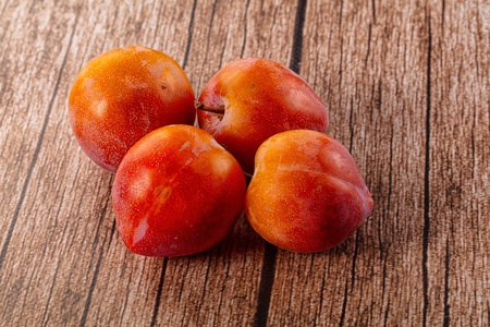 Ripe sweet juicy fresh plums heapの写真素材