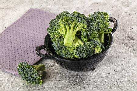 Raw green fresh broccoli cabbage in the bowl