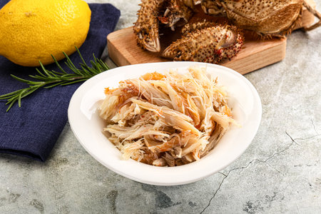 Wild natural crab meat for salad served lemon