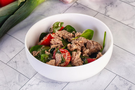 Salad with canned tuna, chtrry tomatoes and spinachの写真素材