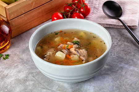 Chicken homemade soup with potato and carrot