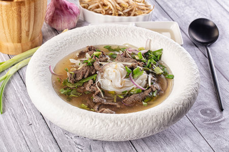 Vietnamese Pho Bo soup with beef and noodles