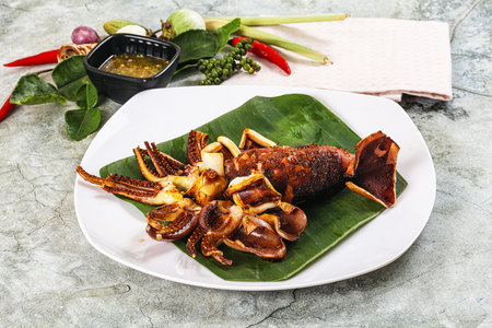 Delicous Grilled squid with sauce and spices