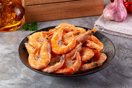 Boiled tiger prawns in the bowl for snackの写真素材