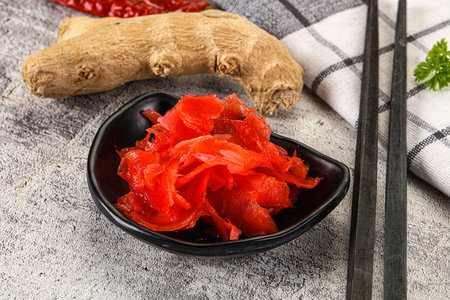 Marinated spicy ginger root in the bowlの写真素材