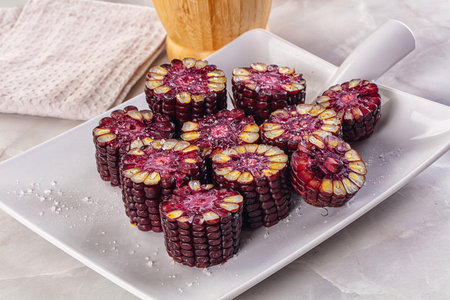 Ripe boiled black corn maize garnish