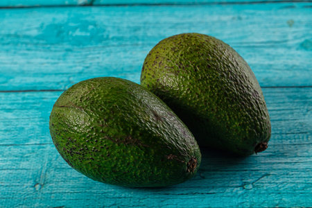 Raw ripe green juicy avocado tropical fruit