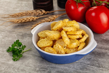 Crunchy croutons heap - roasted bread for snack