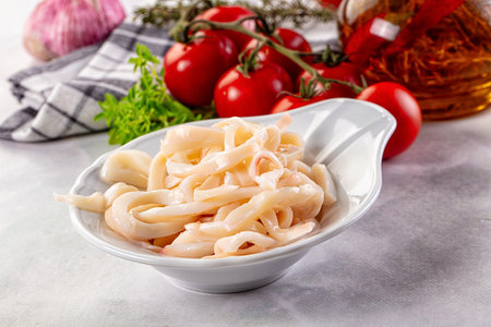 Canned marinated squid rings heap snack appetizer