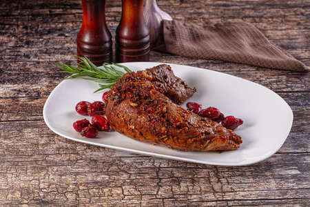 Baked pork sirloin with spicesの写真素材