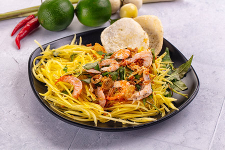 Asian salad with mango and prawn