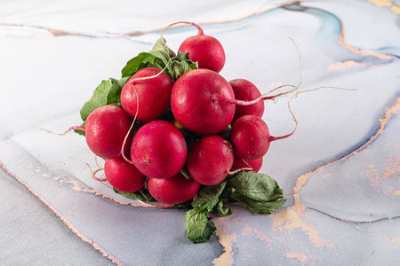 Raw fresh ripe radish root heap