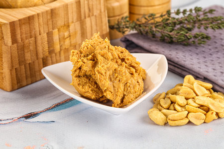 Crunchy peanut butter fat product for breakfast