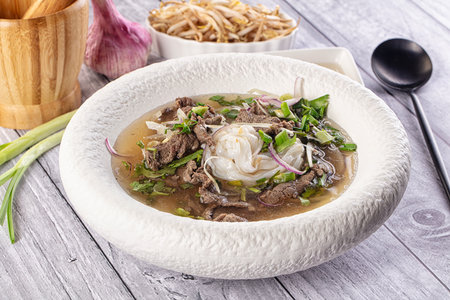 Vietnamese Pho Bo soup with beef and noodles