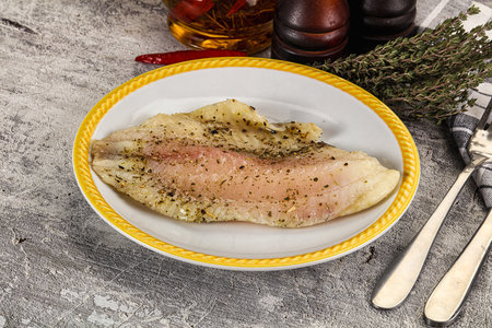 Baked tilapia fish fillet with spices