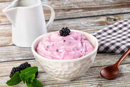 Organic tasty dairy yoghurt with fresh blackberryの写真素材