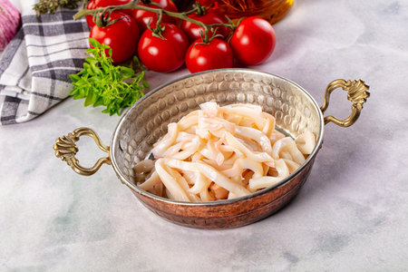 Canned marinated squid rings heap snack appetizerの写真素材