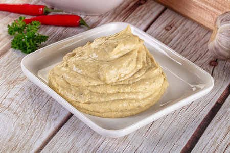 Natural organic homemade chickpea hummus in the bowl
