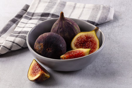 Ripe juicy sweet purple fig fruitの写真素材