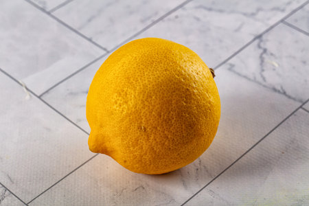 Ripe sour juicy whole lemon fruitの写真素材