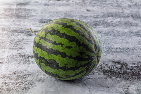 Ripe sweet juicy green whole watermelonの写真素材