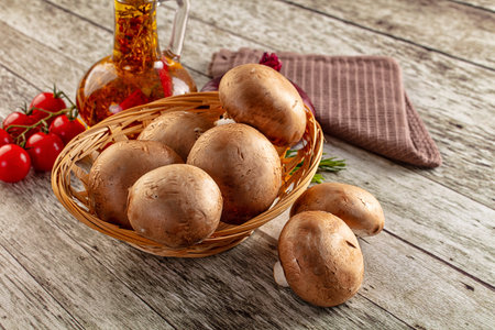 Raw brown champignon heap for cookingの写真素材