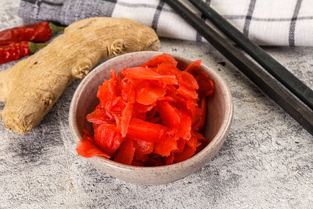 Marinated spicy ginger root in the bowlの写真素材
