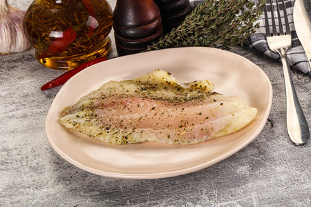 Baked tilapia fish fillet with spices