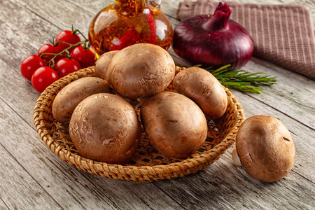 Raw brown champignon heap for cookingの写真素材