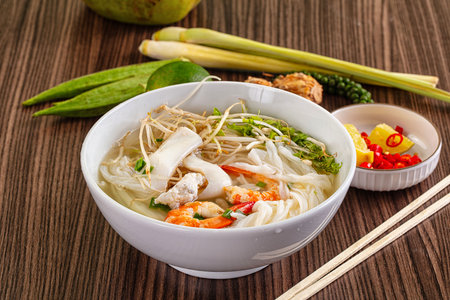 Vietnamese soup Pho with seafood - prawn