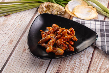 Razor shell clam with spicy sauce