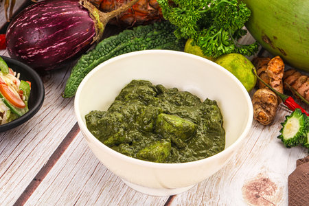 Vegetarian Indian cuisine - Palak paneer cheese with spinach