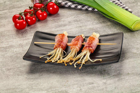 Grilled enoki mushroom with bacon roll wrapの写真素材