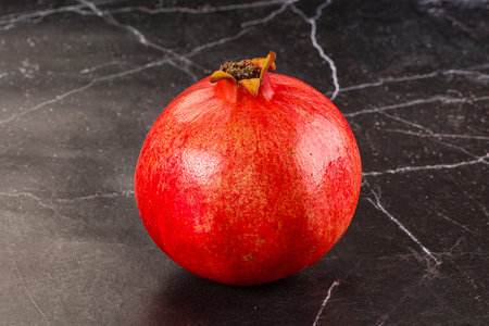 Ripe sweet juicy red pomegranate fruit
