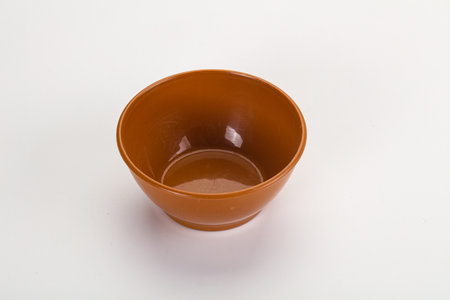 Empty clean color bowl dishware isolatedの写真素材