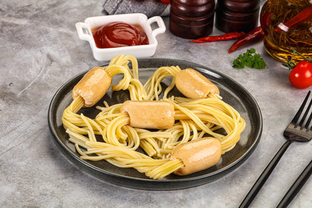 Dietary baby chicken sausage with spaghetti and sauce