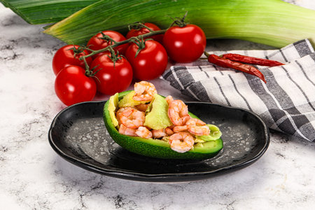 Dietary avocado cut with prawn and lemon juiceの写真素材