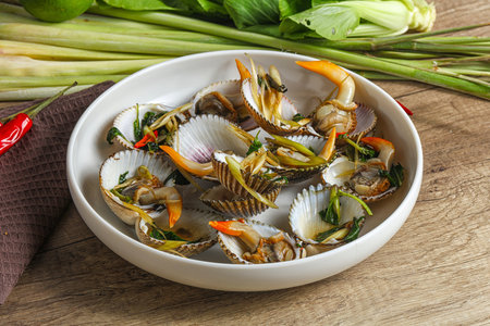 Delicious Asian mollusk shell steamed with spicesの写真素材