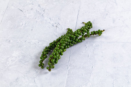 Fresh raw green natural branch pepper cornの写真素材