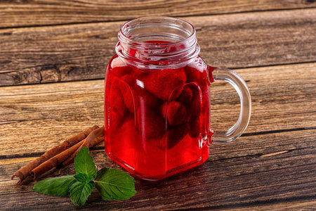 Sweet juicy cold strawberry lemonade served mint