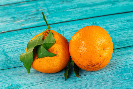 Sweet maniola citrus tropical fruit with leavesの写真素材